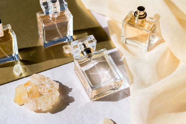 Inspired perfume bottles arranged with soft daily fragrance details for a Soghaat guide to everyday inspired perfumes