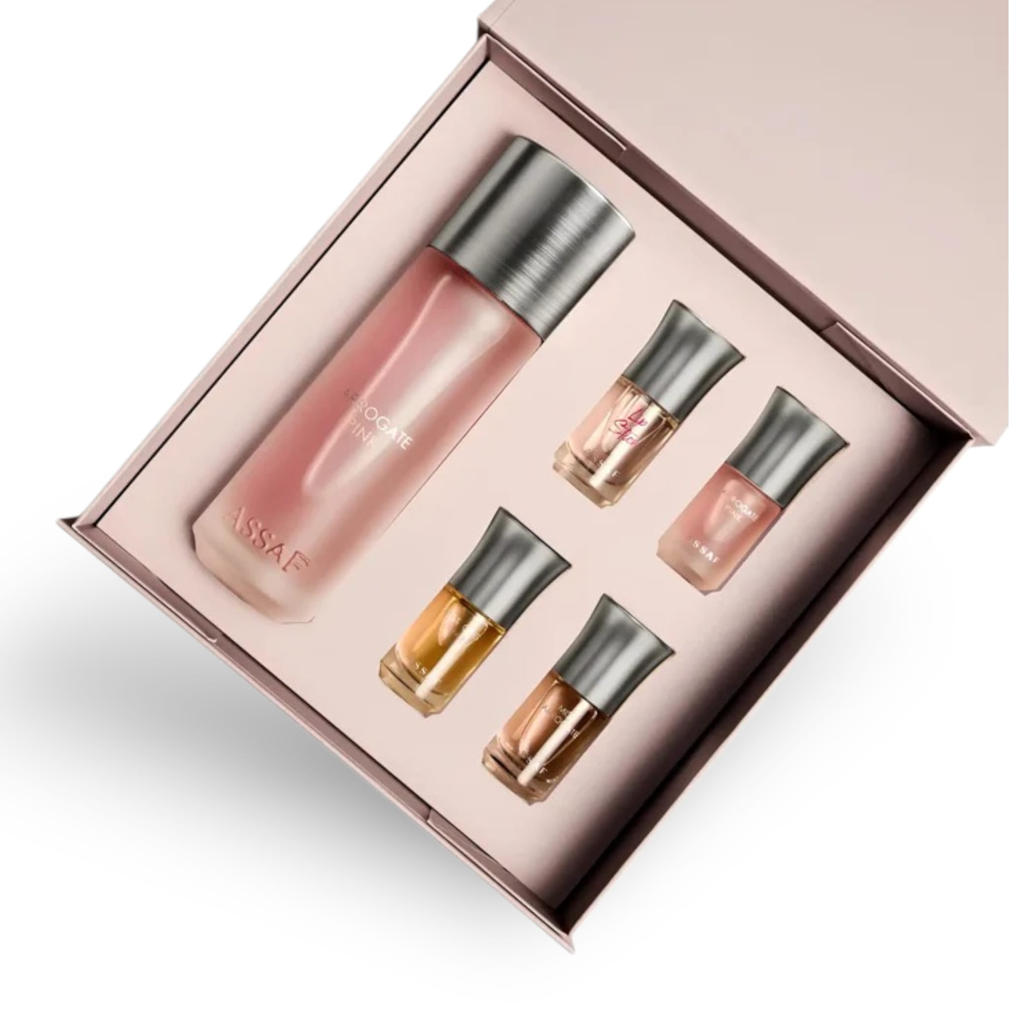 Angled view of Arrogate Pink Collection Eau de Parfum and gift set packaging