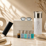 Assaf Aura Collection & Sunglass Gift Set: Aura Pegasus perfume, 5 mini Arrogate perfumes, and blue-tinted sunglasses.