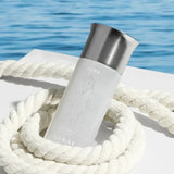 Assaf Aura Pegasus Collection fragrance bottle with a marble-like design and silver cap, set against a rope and water backdrop.