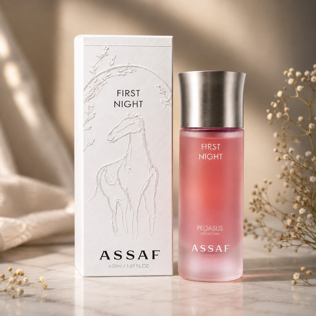 Assaf First Night Eau de Parfum 150ml, a sweet amber gourmand fragrance with a pink gradient bottle and embossed horse design on the box.