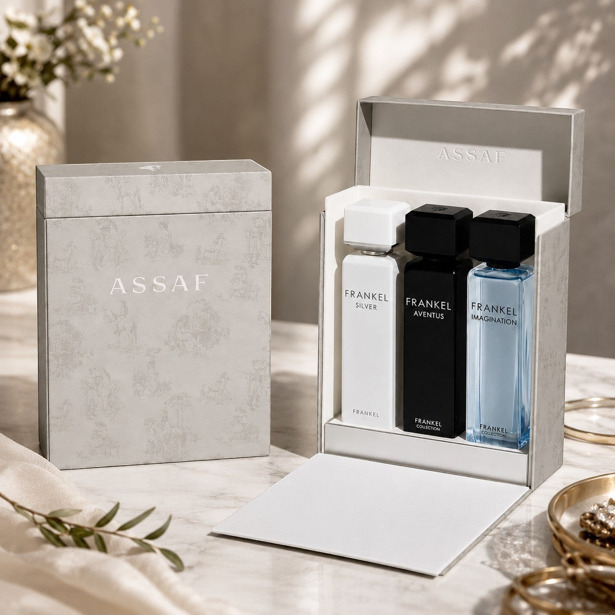 Assaf Frankel Collection Gift Set with three Eau de Parfum bottles: Frankel Silver, Frankel Aventus, and Frankel Imagination.
