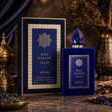 Bleu D'Arabie by Adyan 100ml Extrait de Parfum in a blue velvet bottle and matching box on a marble surface.