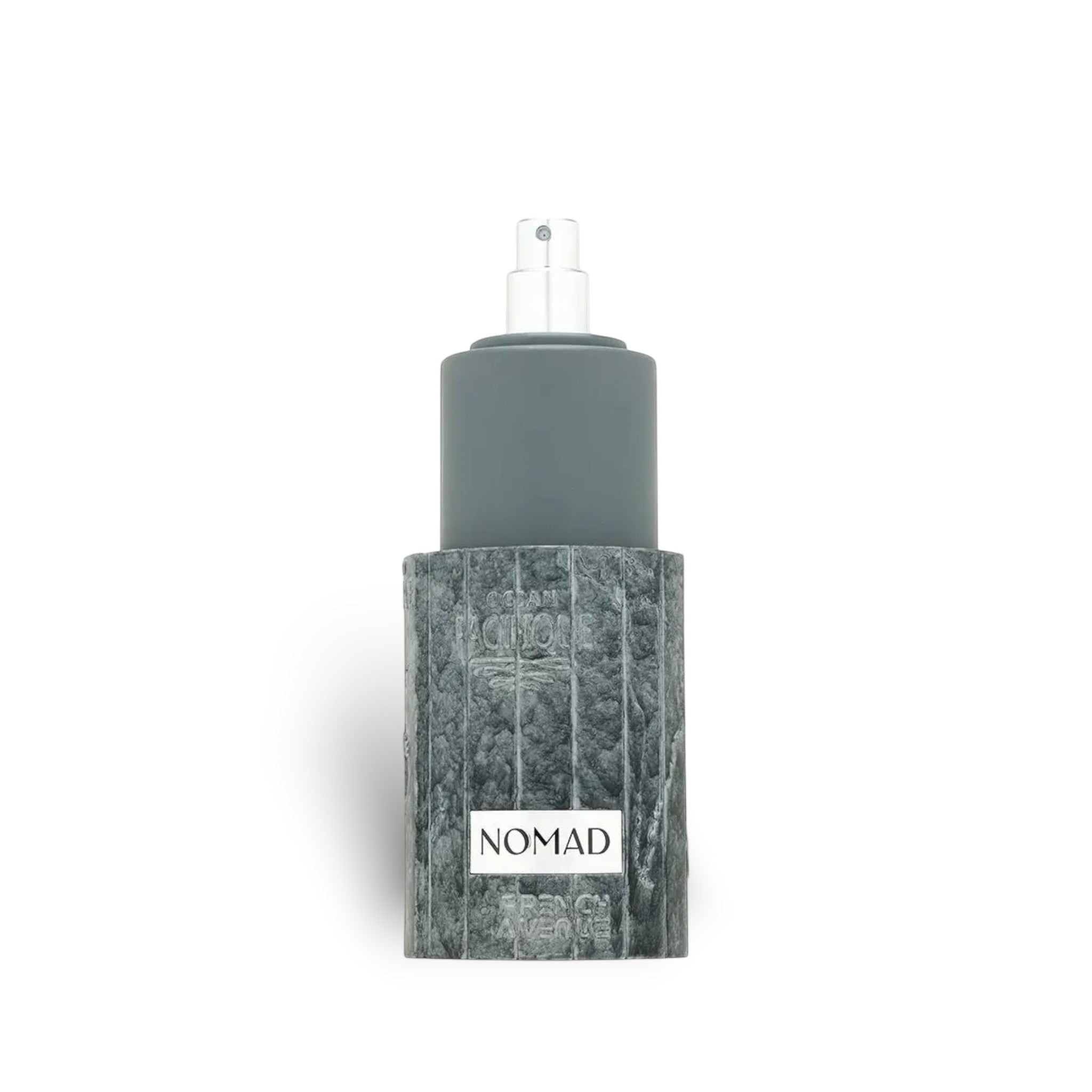 French Avenue Nomad 100ml Extrait de Parfum bottle with grey textured base and grey cap.