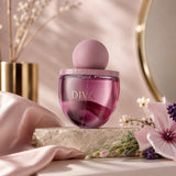 Laverne Diva perfume gift set for women, featuring a pink glass bottle with gold lettering and a matching pink spherical cap.