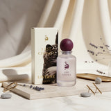 Laverne Last Chance Eau de Parfum bottle with plum cap and leopard print box. Fresh woody aromatic scent.
