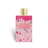 Soghaat Anfar Cotton Candy Extrait de Parfum in a pink rectangular bottle with colourful paint splatter design.