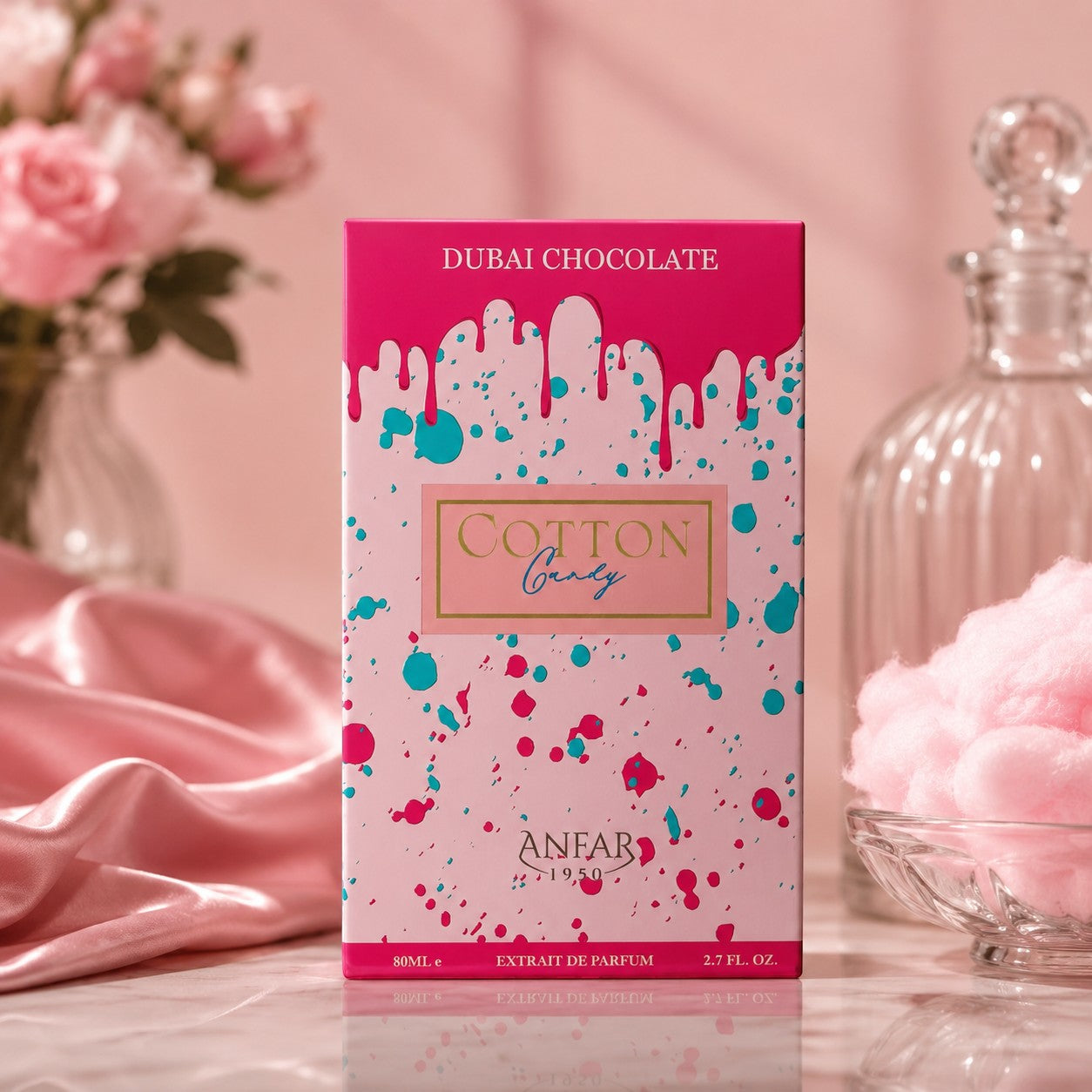 Soghaat Anfar Cotton Candy Extrait de Parfum box with pink drip design, displayed with pink roses and cotton candy.