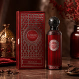 Soghaat Anfar Fouco 100ml Extrait de Parfum in a deep red bottle with intricate silver detailing and matching gift box.