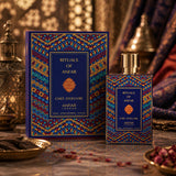 Soghaat Anfar London Chef d’Oeuvre Extrait de Parfum bottle and box with vibrant geometric patterns on a table.