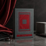 Soghaat Anfar London Intense Sport 100ml Extrait de Parfum box in grey and red packaging on a dark marble surface.