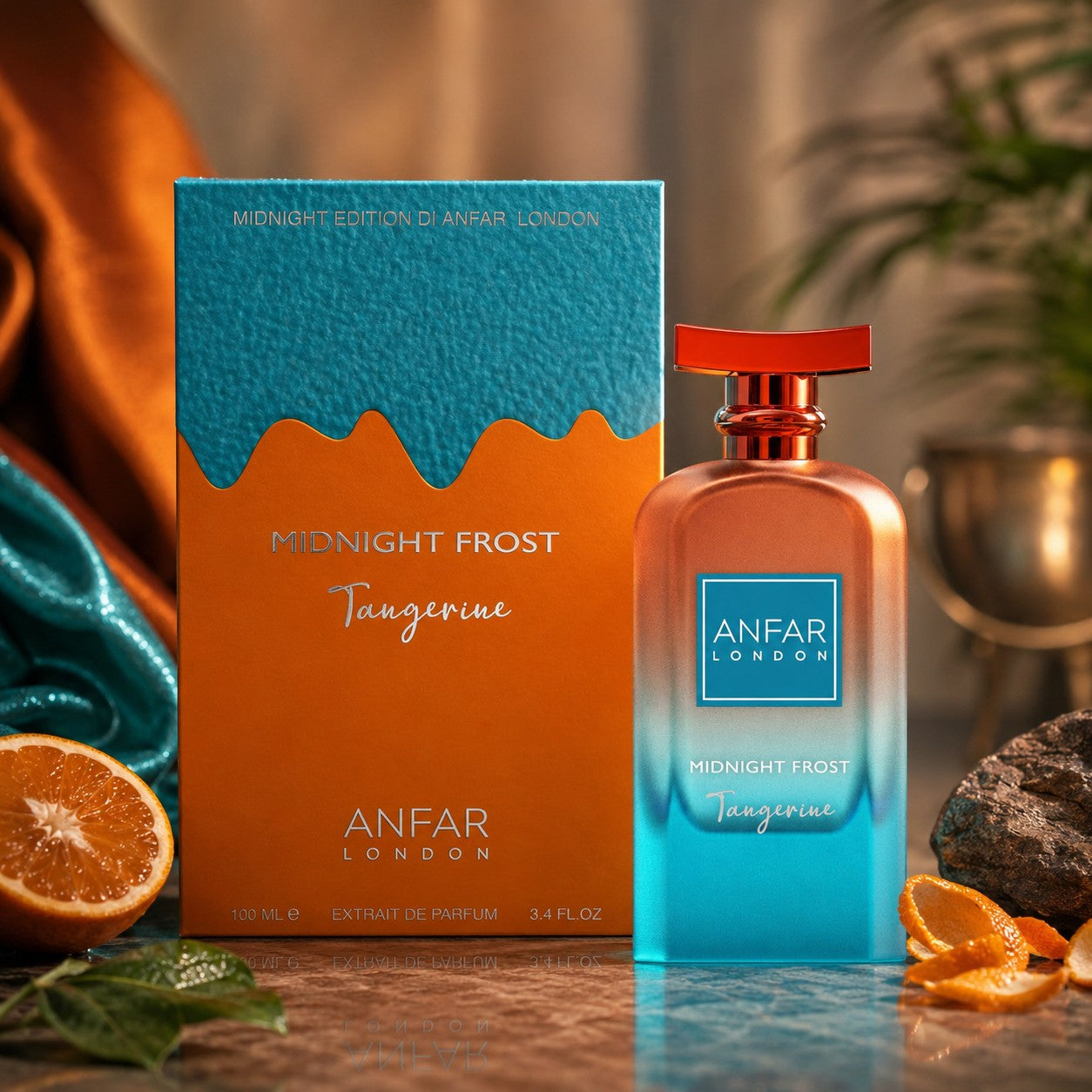 Soghaat Anfar London Midnight Frost Tangerine perfume bottle and box with orange and blue gradient design.