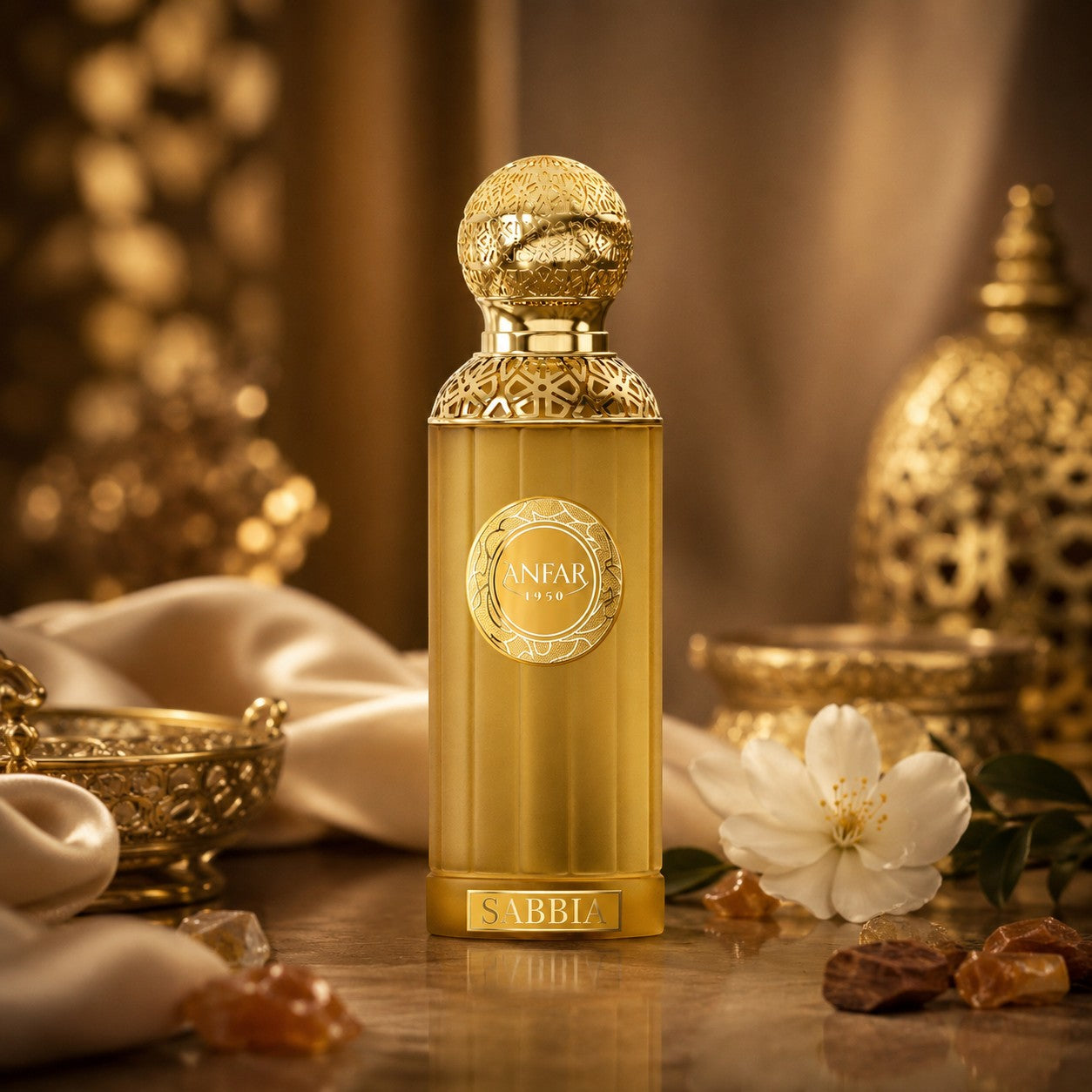 Soghaat Anfar Sabbia 100ml Extrait de Parfum in a gold bottle with intricate cap, set against a luxurious backdrop.