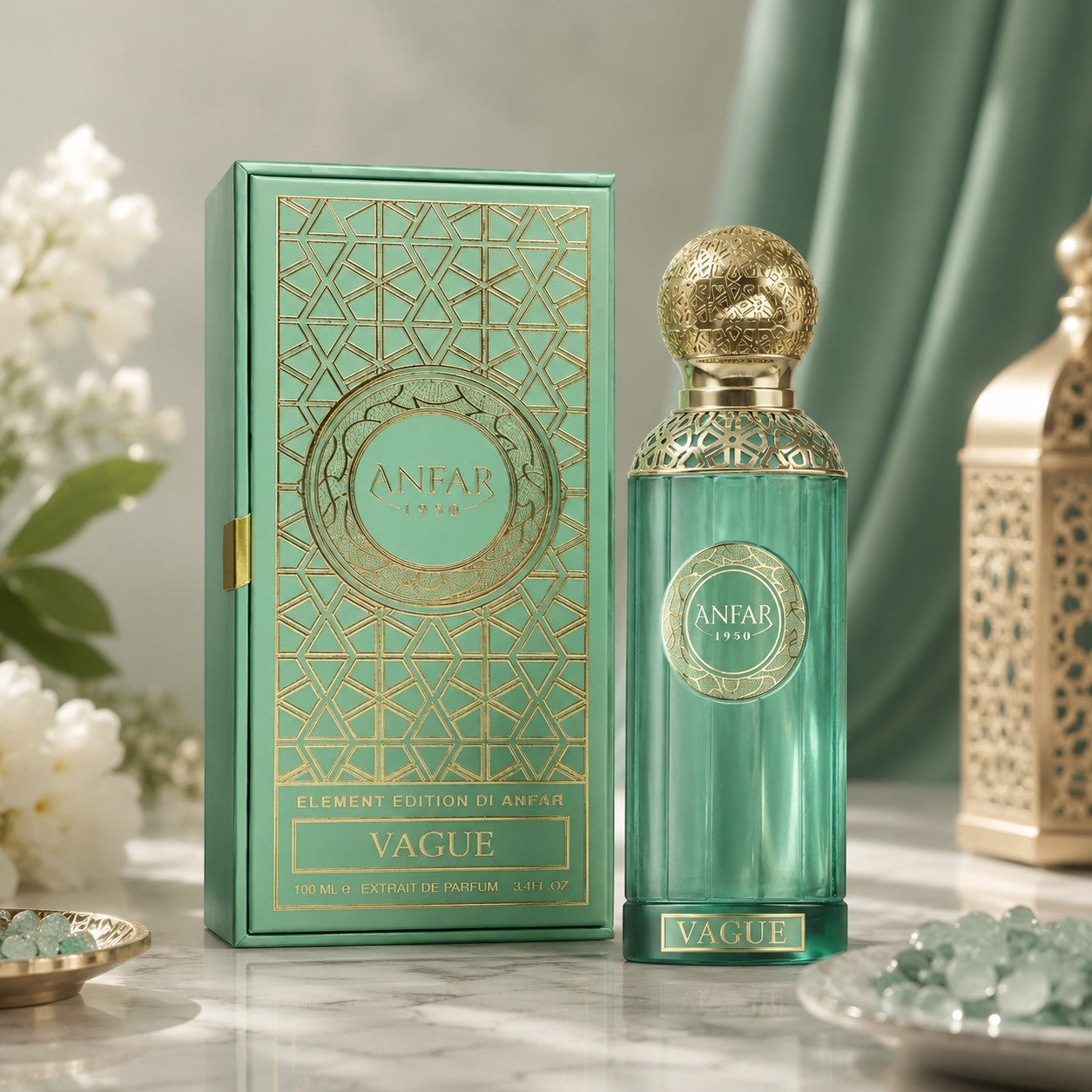 Soghaat Anfar Vague 100ml Extrait de Parfum in a green glass bottle with gold cap next to its matching patterned box.