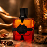 Soghaat Aromatix Forbidden Fruits Extrait de Parfum, a unisex woody aromatic fragrance with amber and citrus notes in a gradient orange glass bottle.