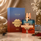 Soghaat Aromatix Teas Me Extrait de Parfum bottle with gradient blue and orange glass, gold accents, and matching ombre box.