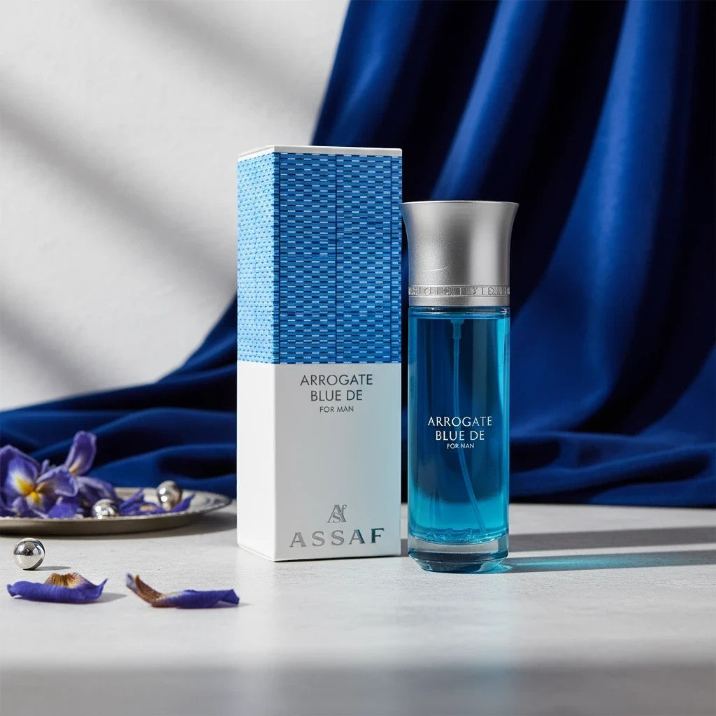 Soghaat Arrogate Blue De 200ml Eau de Parfum for men, fresh citrus woody spicy fragrance with blue liquid in a clear bottle.