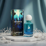 Soghaat Atlantis Homme Eau de Parfum for men, a sweet amber gourmand fragrance in a blue glass bottle with a decorative white cap.