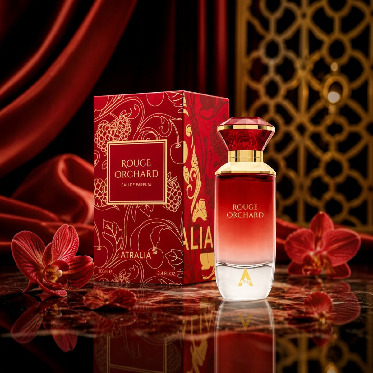 Soghaat Atralia Rouge Orchard 100ml Eau de Parfum bottle and box with red orchids on a reflective surface.