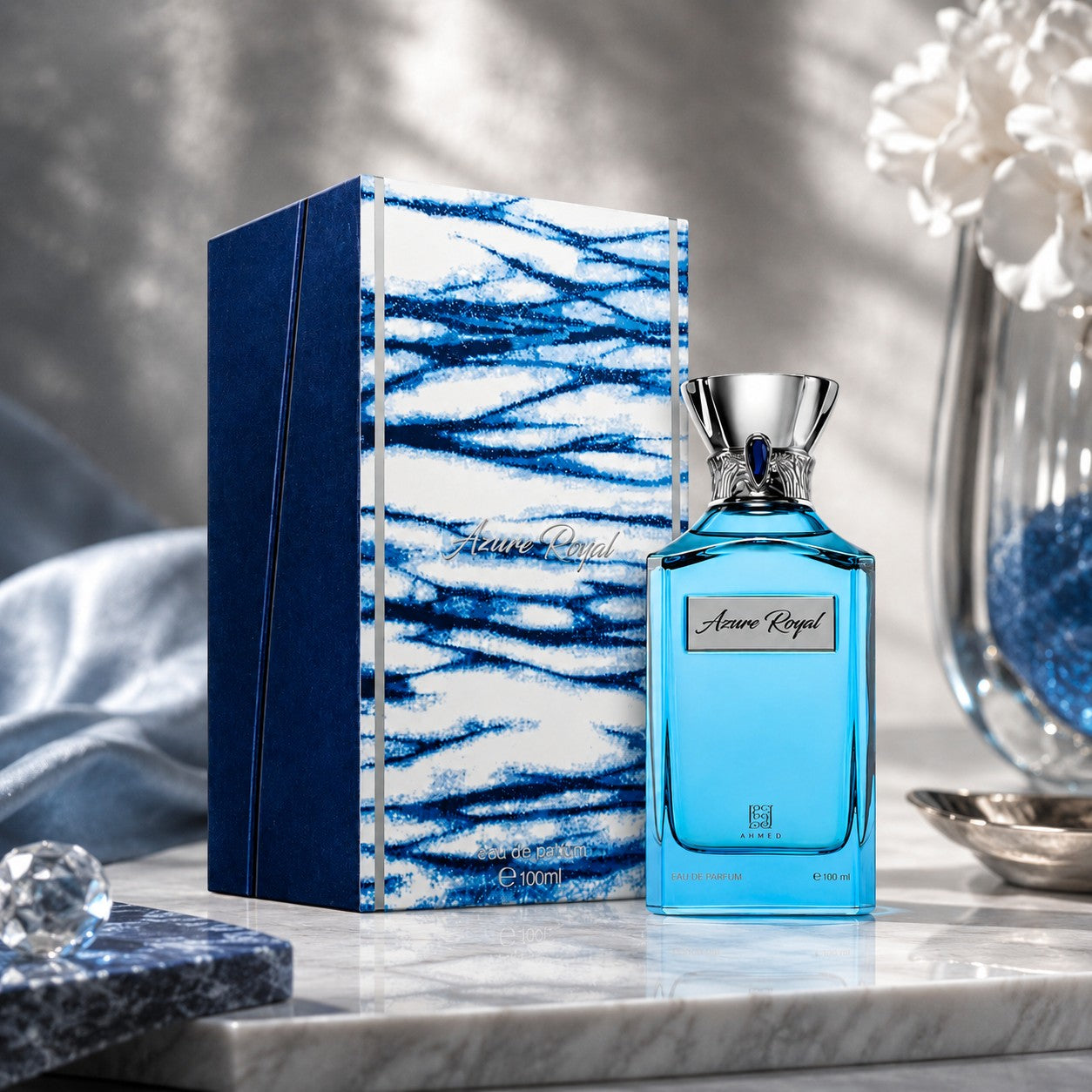 Soghaat Ahmed Al Maghribi Azure Royal 100ml Eau de Parfum bottle and box with blue marble pattern on marble surface.