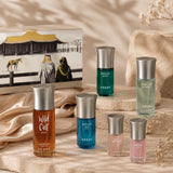Soghaat Bakhur Collection perfume gift set with six Assaf fragrances in amber, blue, green, and pink bottles. Includes a decorative box.