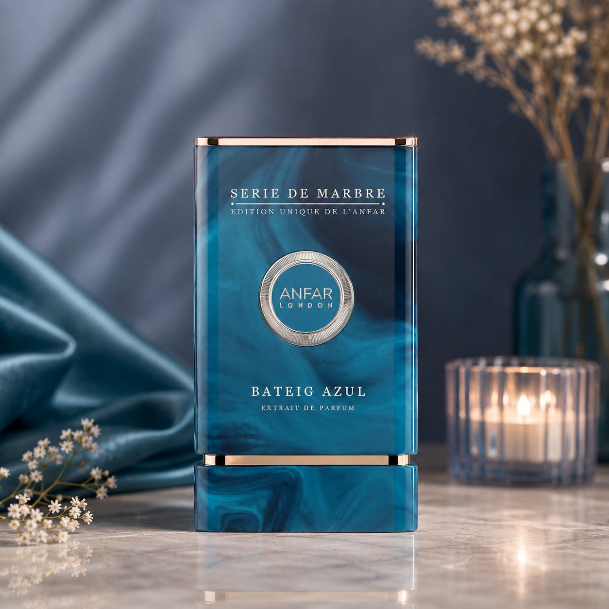 Soghaat Anfar London Bateig Azul Extrait de Parfum in a blue marble-effect bottle on a marble surface.