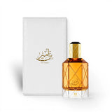 Soghaat Bin Ameer 90ml Extrait de Parfum for men, amber glass bottle with gold cap, alongside white textured box.