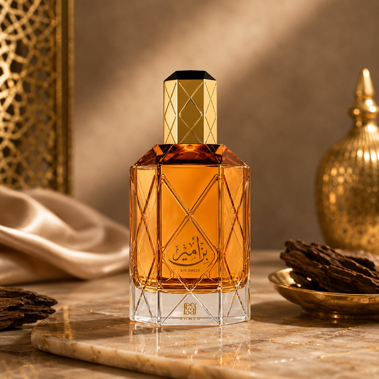 Soghaat Bin Ameer 90ml Extrait de Parfum for men, a sweet amber gourmand fragrance with a faceted amber glass bottle and gold accents.