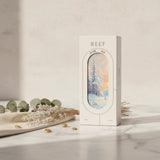 Soghaat Blanc Ash 150ml Eau de Parfum unisex amber woody oriental fragrance with winter forest scene on bottle.
