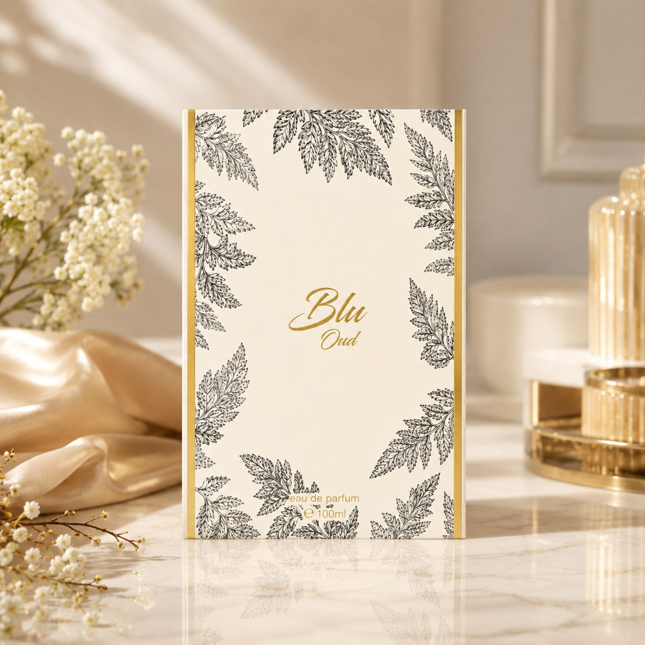 Soghaat Blu Oud Extrait de Parfum 100ml box with elegant botanical leaf illustrations on a cream background.