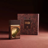 Soghaat Bombay Oud 80ml Eau de Parfum bottle with gold accents and paisley patterned box. Unisex woody, amber, leathery fragrance.