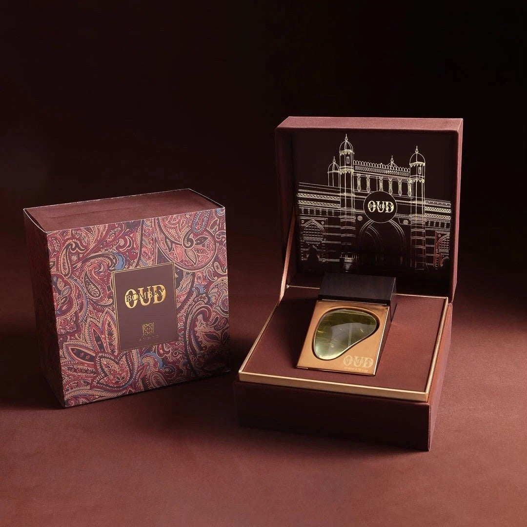 Soghaat Bombay Oud 80ml Eau de Parfum for unisex, featuring a gold bottle with green liquid and intricate paisley box.
