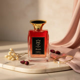 Soghaat Boujee 100ml Eau de Parfum for women, a fruity floral woody fragrance with a red gradient glass bottle and gold accents.