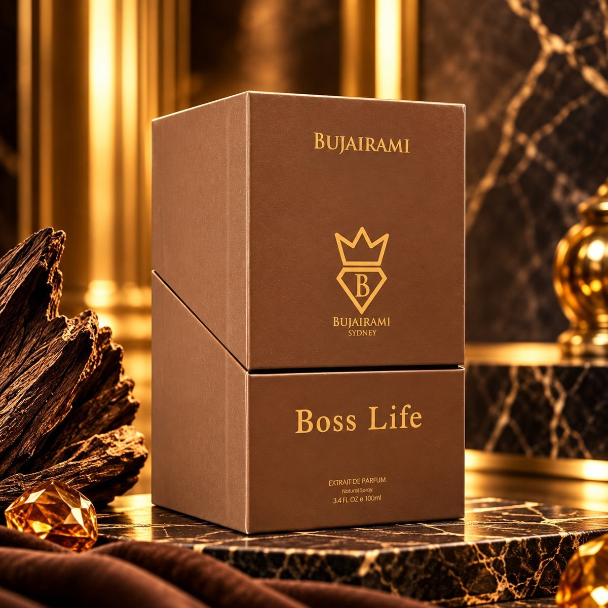 Soghaat Bujairami Boss Life 100ml Extrait de Parfum brown box on a marble surface with gold accents