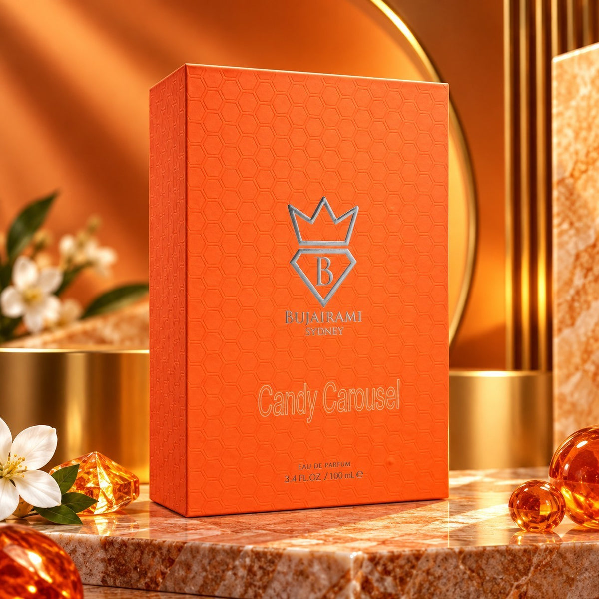 Soghaat Bujairami Candy Carousel 100ml Eau de Parfum in a vibrant orange textured box on a marble surface.