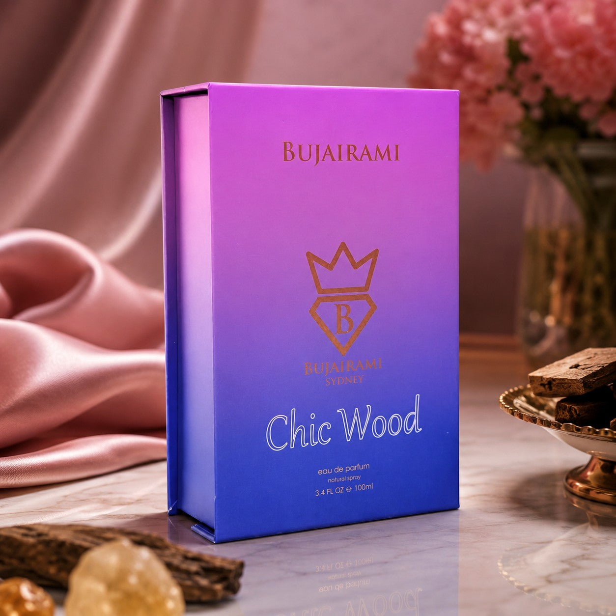 Soghaat Bujairami Chic Wood 100ml unisex eau de parfum in a vibrant purple and blue gradient box with gold logo.
