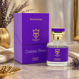 Soghaat Bujairami Cosmic Fever 100ml Extrait de Parfum bottle and purple box on a marble surface with lavender.