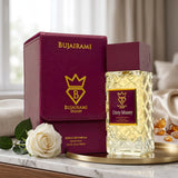 Soghaat Bujairami Dirty Money 100ml Extrait de Parfum bottle and leather case with a white rose on a marble surface.