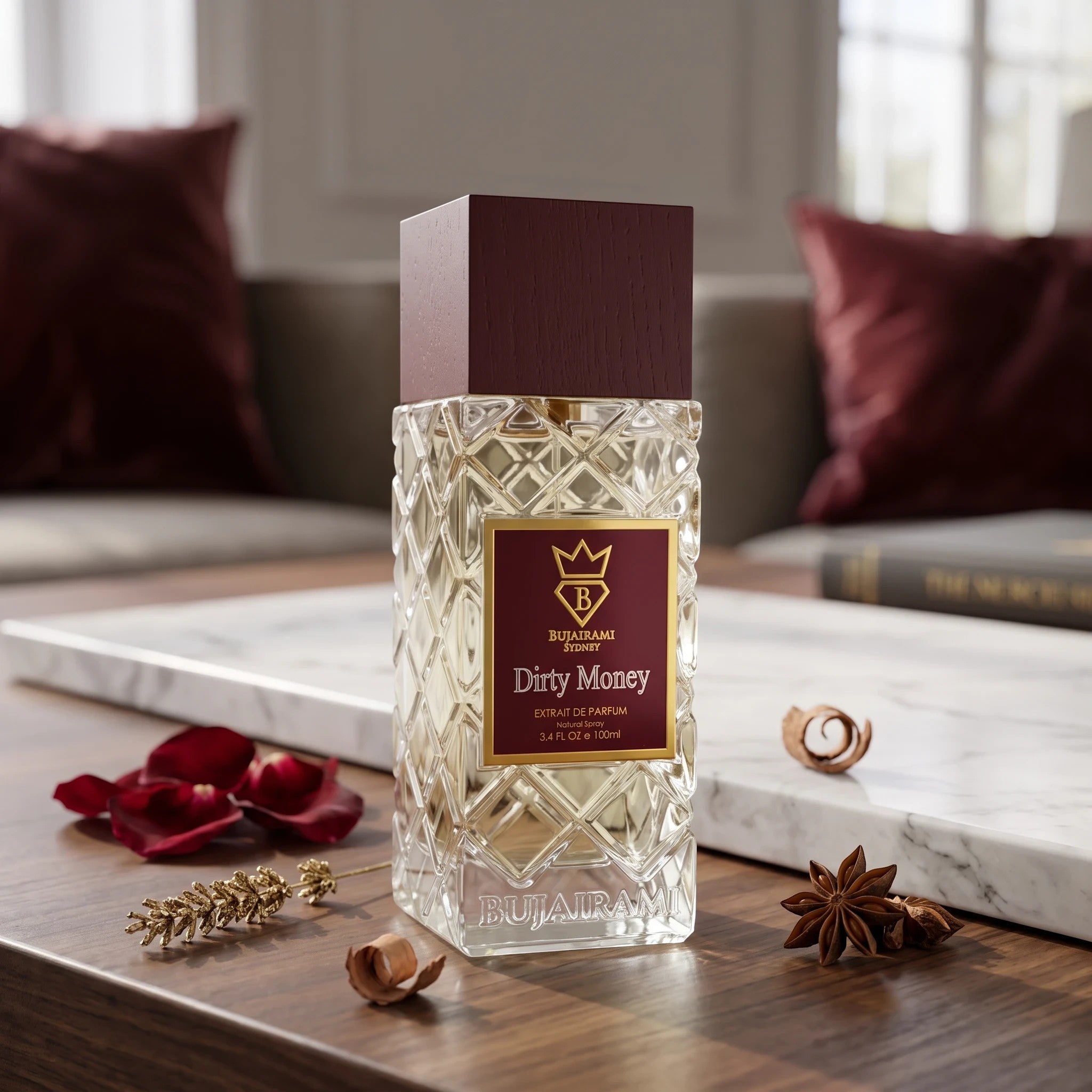 Soghaat Bujairami Dirty Money 100ml Extrait de Parfum bottle with diamond-cut glass on a wooden table.