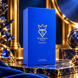 Soghaat Bujairami Drip No.7 100ml Eau de Parfum in a vibrant blue box with gold branding on a luxurious marble display.