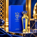 Soghaat Bujairami Drip No.7 unisex Eau de Parfum in a blue and gold bottle with matching box on a marble surface.