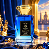 Soghaat Bujairami Emperor 100ml Eau de Parfum in a faceted blue glass bottle with a gold cap on a marble surface.