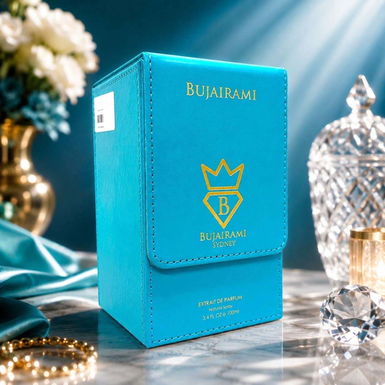 Soghaat Bujairami Glorious 100ml Extrait de Parfum in a bright blue leather-style box with gold logo branding.