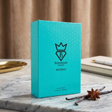 Soghaat Bujairami Inferno unisex Eau de Parfum in a vibrant turquoise box with a honeycomb pattern on marble surface.