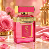 Soghaat Bujairami Ivory Kiss 100ml Eau de Parfum in a vibrant pink glass bottle with gold accents and textured cap.
