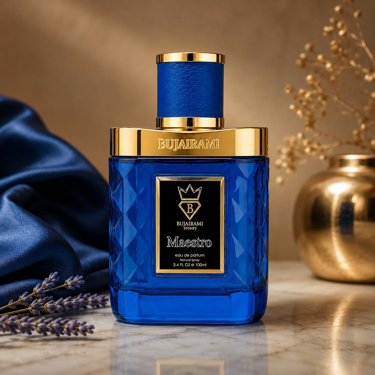 Soghaat Bujairami Maestro 100ml unisex Eau de Parfum in a blue quilted glass bottle with gold accents on a marble surface.