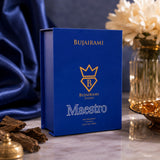 Soghaat Bujairami Maestro 100ml Eau de Parfum blue box with gold branding on a marble surface with silk and wood accents
