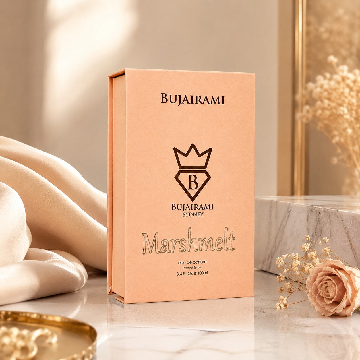Soghaat Bujairami Marshmelt 100ml Eau de Parfum in a peach-coloured box with elegant branding on a marble surface.