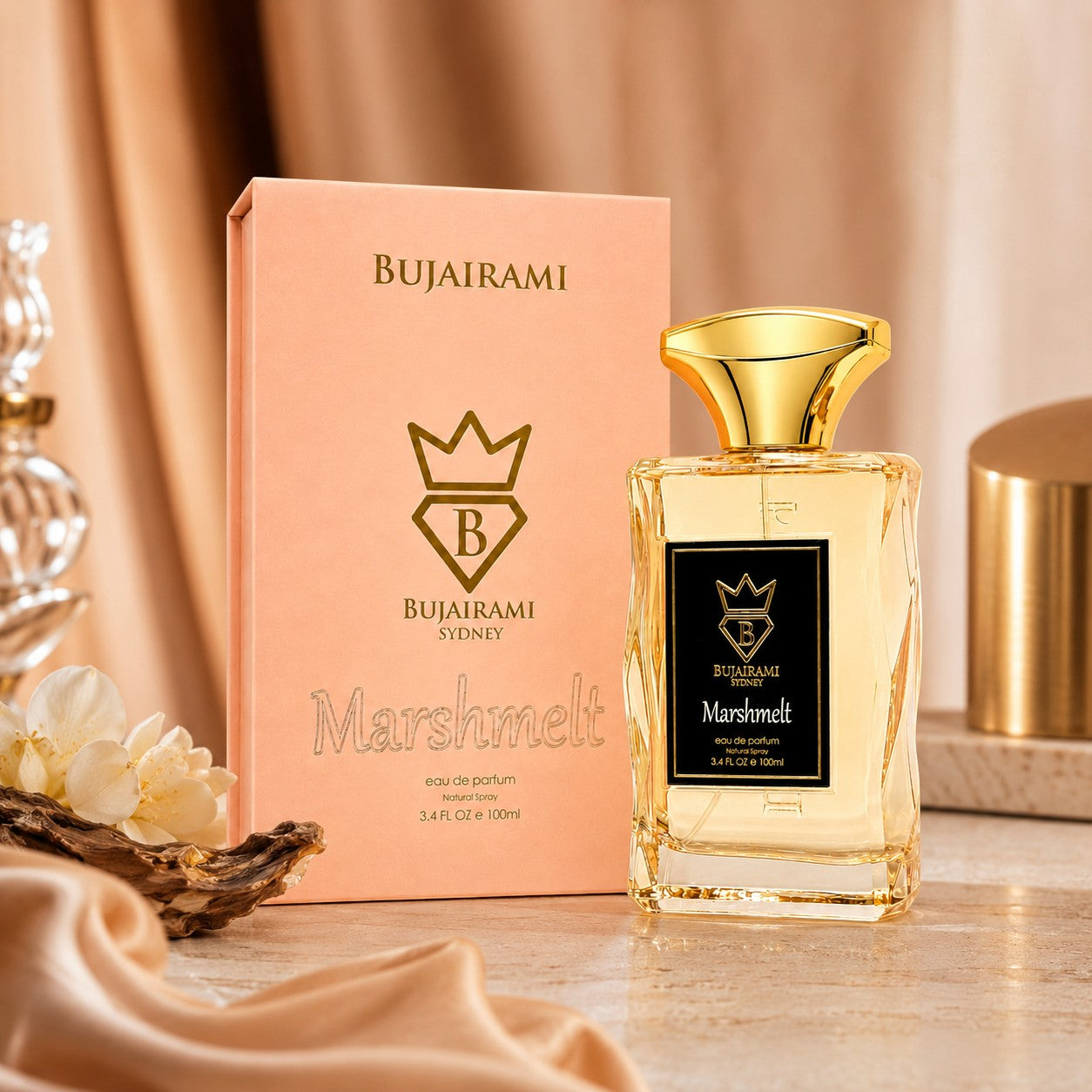 Soghaat Bujairami Marshmelt 100ml Eau de Parfum bottle and peach-coloured box with gold accents on a marble surface.