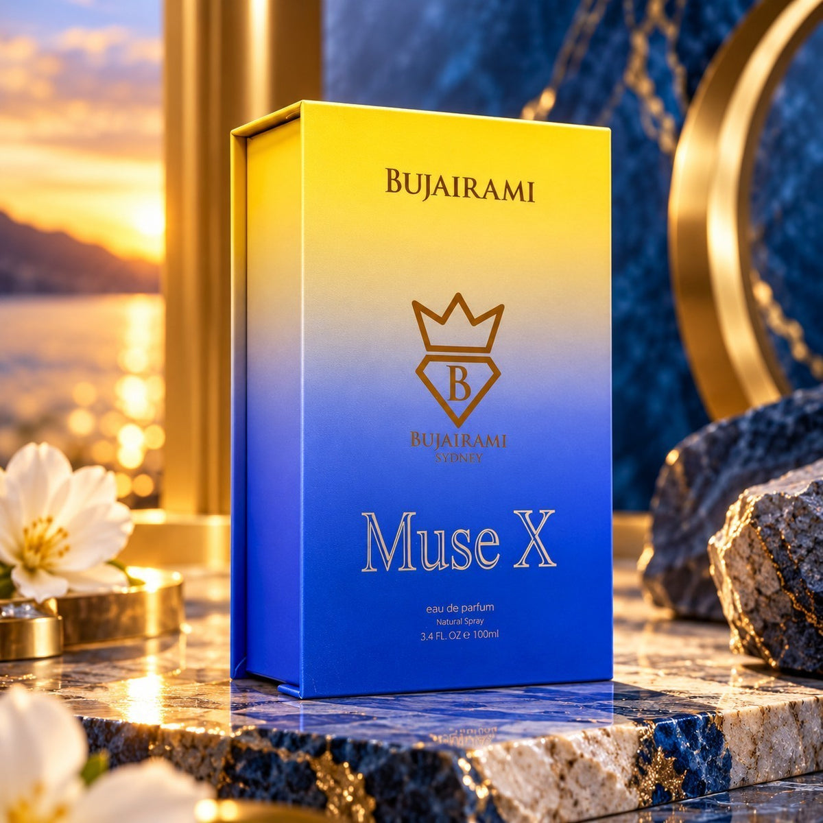 Soghaat Bujairami Muse X 100ml Eau de Parfum box with yellow to blue gradient, displayed on a marble surface at sunset.
